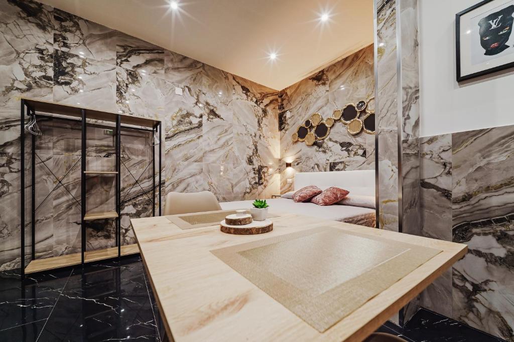 Zona giorno con angolo cottura della casa vacanze Il Filo, Albergheria Palermo